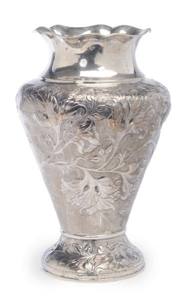 A LARGE TURKISH SILVER FLOWER REPOUSSE VASE,