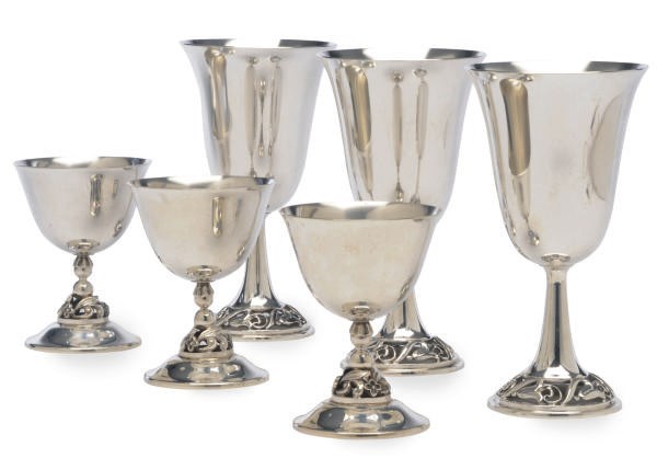 AN AMERICAN SILVER PART DRINKWARE SET IN THE 'JENSEN' STYLE,