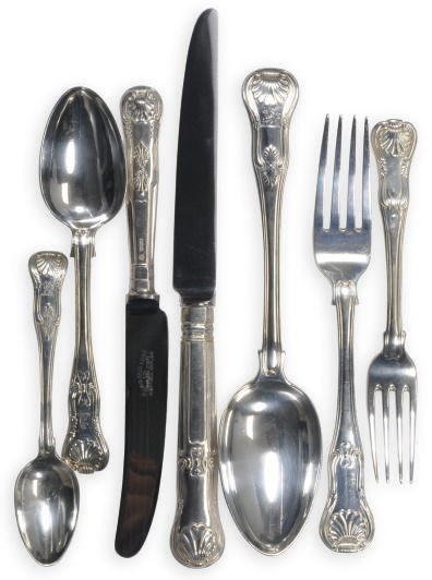 A SCOTTISH CHEESE SCOOP AND AN ASSEMBLED GEORGIAN AND ELIZABETH II PART FLATWARE SERVICE,