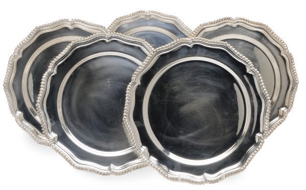 AN ENGLISH SET OF FORTY-FOUR SILVER-PLATED SERVICE PLATES,