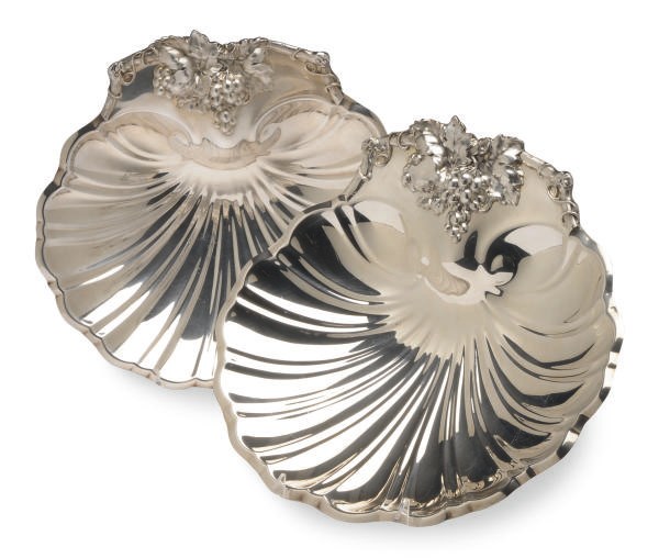 A SET OF TWELVE AMERICAN SILVER-PLATED SHELL- FORM DISHES,