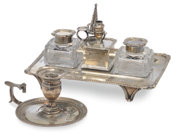 A VICTORIAN INKSTAND AND TWO SILVER-MOUNTED INKPOTS AND A CHAMBERSTICK,