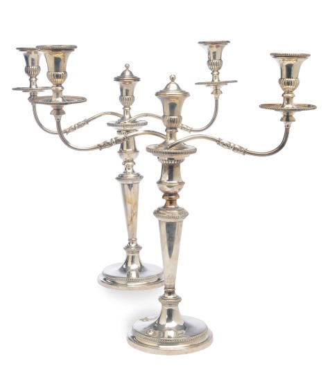 A PAIR OF VICTORIAN SILVER-PLATED TWO LIGHT CANDLEABRA,