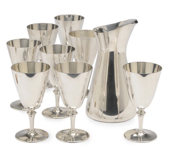AN AMERICAN SILVER COCKTAIL PITCHER AND A SET OF EIGHT GOBLETS,