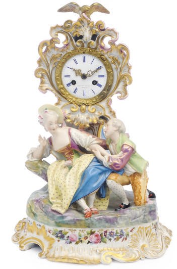 A FRENCH PORCELAIN MANTEL CLOCK,