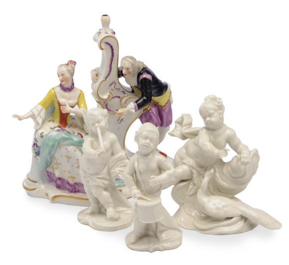 TWO GERMAN PORCELAIN FIGURE GROUPS AND A PAIR OF WHITE PUTTI AS MUSICIANS,