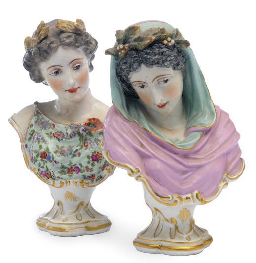 A PAIR OF AUSTRIAN PORCELAIN BUSTS OF WOMEN EMBLEMATIC OF WINTER AND SUMMER,