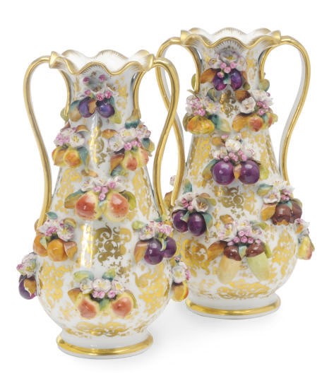 A PAIR OF CONTINENTAL JACOB PETITE-STYLE PORCELAIN FRUIT AND FLOWER- ENCRUSTED TWO-HANDLED VASES,