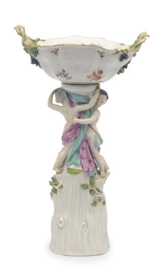 A GERMAN PORCELAIN CENTERPIECE BASKET AND STAND,
