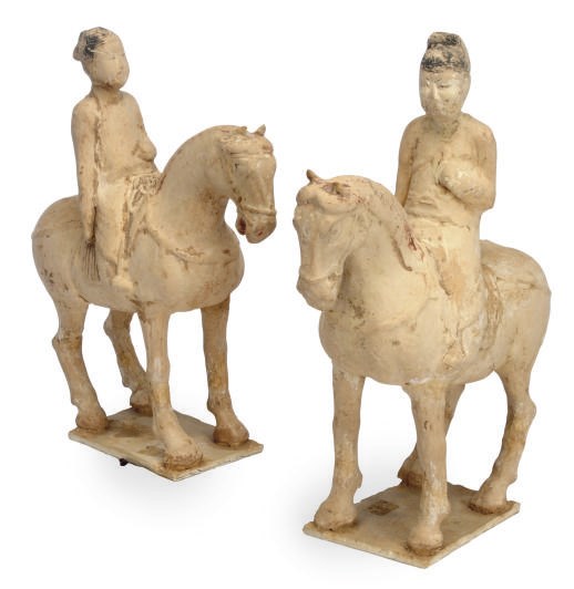 A PAIR OF CHINESE PAINTED POTTERY FIGURES OF EQUESTRIANS,