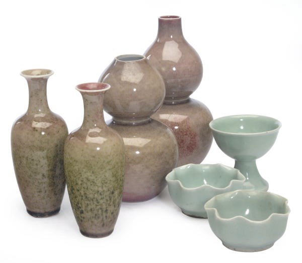 A GROUP OF FOUR CHINESE PORCELAIN PEACHBLOOM-GLAZED VASES AND THREE CELADON VESSELS,