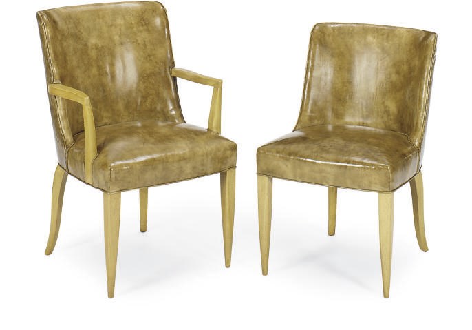 A SET OF TWELVE LIMED OAK AND LEATHER DINIG CHAIRS,