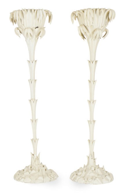 A PAIR OF CREAM-PAINTED FORM TORCHERES,
