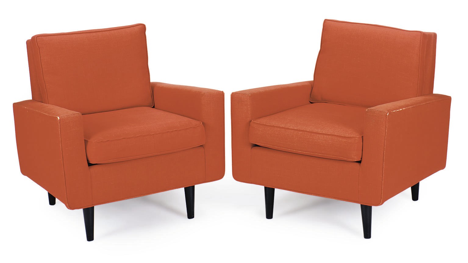 A PAIR OF EBONIZED AND UPHOLSTERED LOUNGE CHAIRS,