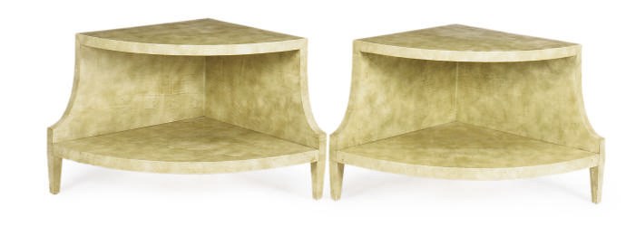 A PAIR OF PARCHMENT TWO-TIER LOW CORNER TABLES,