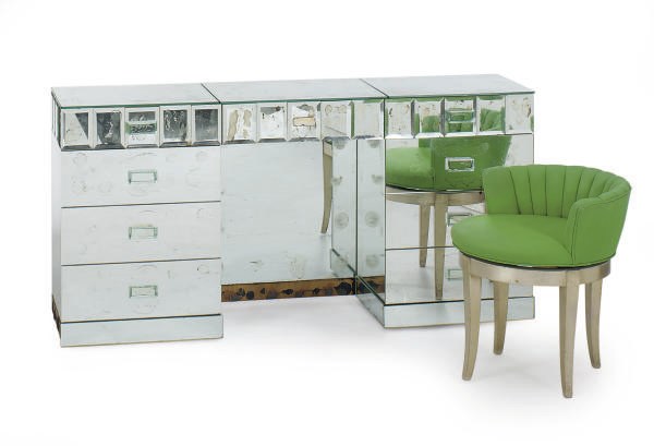 A MIRRORED DRESSING TABLE,