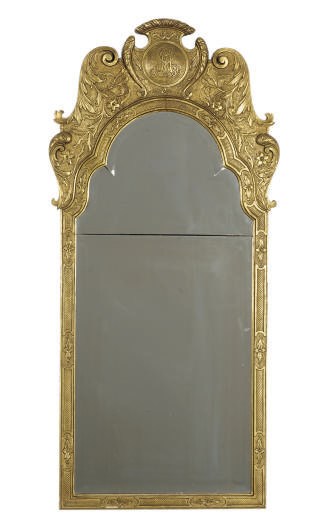 A GILTWOOD AND GILT-COMPOSITION WALL MIRROR,