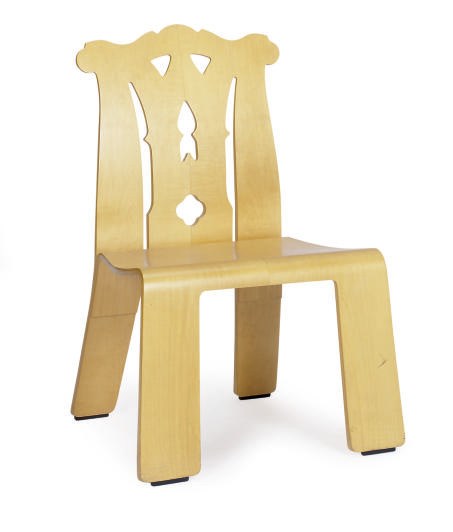 A LAMINATED BIRCH 'CHIPPENDALE' CHAIR,