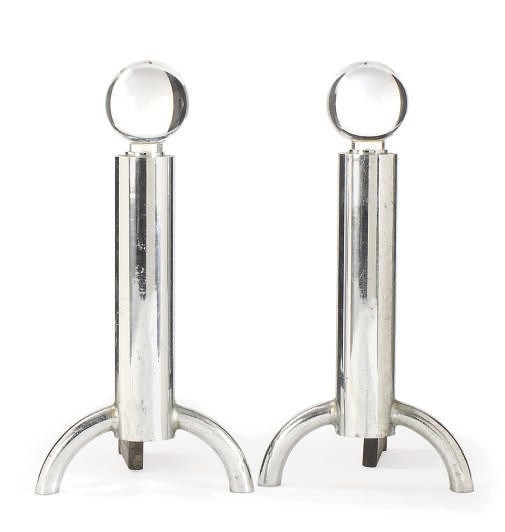 A PAIR OF CHROMED METAL AND GLASS ANDIRONS,