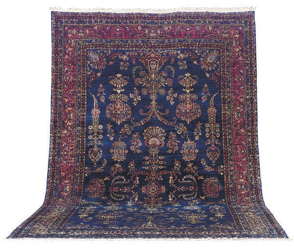 A KIRMAN CARPET,