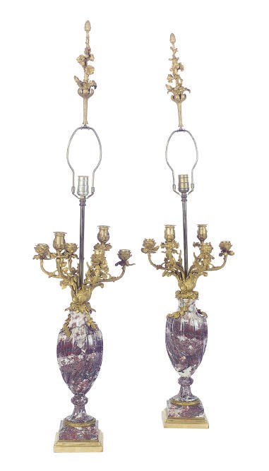 A GILT-BRONZE MOUNTED ROUGE AND WHITE MARBLE CANDELABRA MOUNTED AS LAMPS,