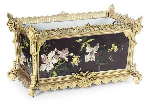 A FRENCH GILT-BRONZE MOUNTED FLORAL PATTERN PAINTED AND ENAMELED JARDINEIRE,