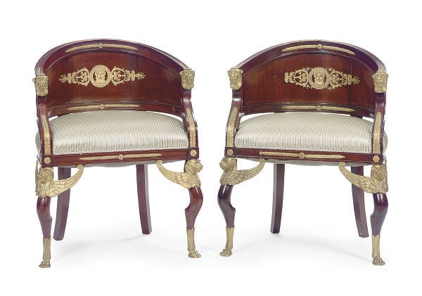 A PAIR OF GILT-BRONZE MOUNTED MAHOGANY ARMCHAIRS,