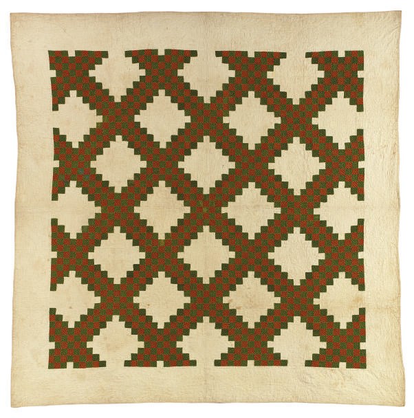 A PIECED AND QUILTED COTTON COVERLET