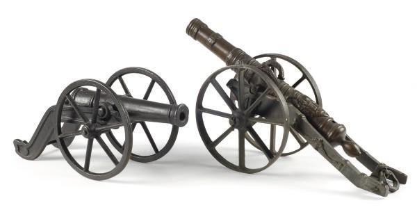 A PATINATED BRONZE TABLE CANNON,
