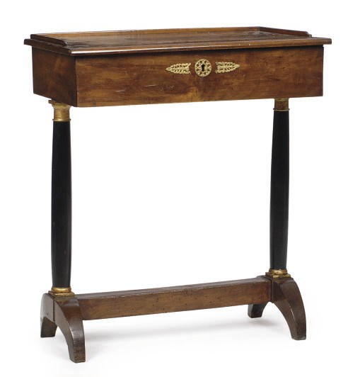 A CONTINENTAL WALNUT AND PART-EBONIZED SIDE TABLE,