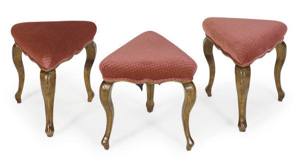 A SET OF THREE ITALIAN FRUITWOOD TRIANGULAR-FORM TABOURETS,