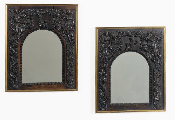 A CONTINENTAL PAIR OF CARVED WOOD FRAMED MIRRORS,