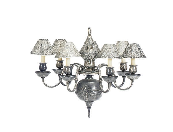 A CONTINENTAL SILVERED METAL SEVEN-LIGHT CHANDELIER,