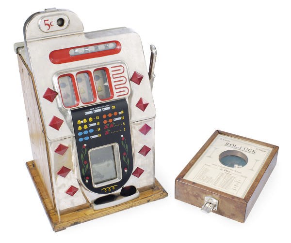 AN AMERICAN NICKEL-PLATED SLOT MACHINE,