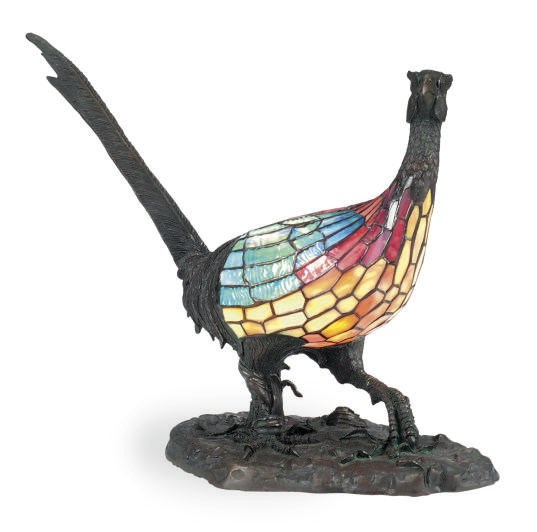 A PATINATED BRONZE AND STAINED-GLASS FIGURAL TABLE LAMP,