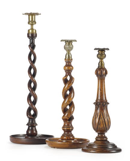 THREE PAIRS OF ENGLISH OAK AND GILT-METAL CANDLESTICKS,
