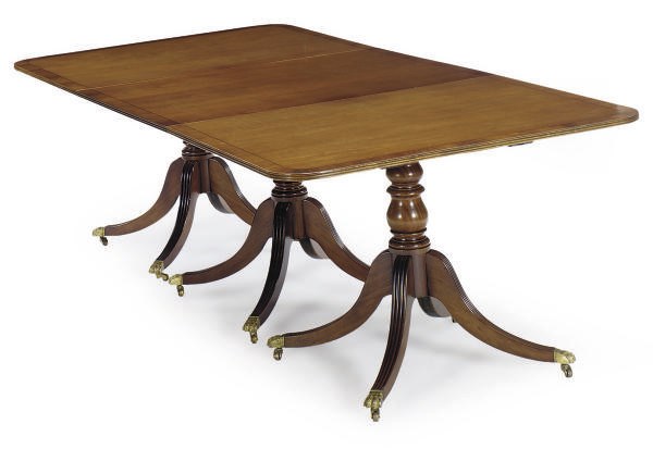 A MAHOGANY TRIPLE PEDESTAL DINING TABLE,
