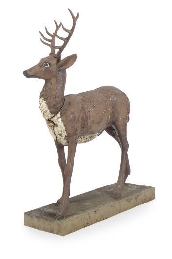 A PAINTED CAST IRON FIGURE OF A STAG,