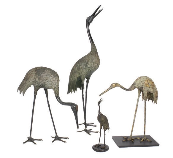 SEVEN PATINATED BRONZE FIGURES OF HERON