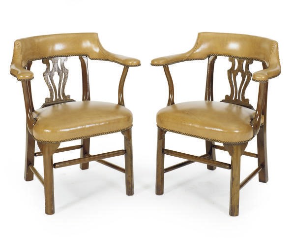 A SET OF FOUR MAHOGANY AND UPHOLSTERED ARMCHAIRS,