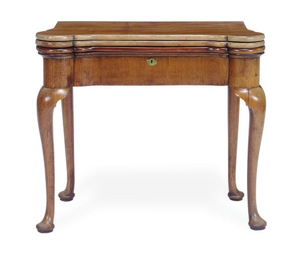 A GEORGE II MAHOGANY TRIPLE-FOLD OVER GAMES TABLE,