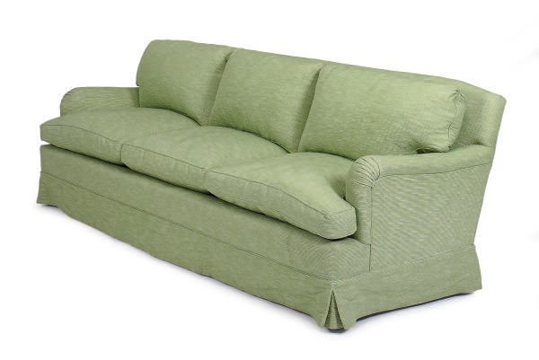 A GREEN COTTON UPHOLSTERED SOFA