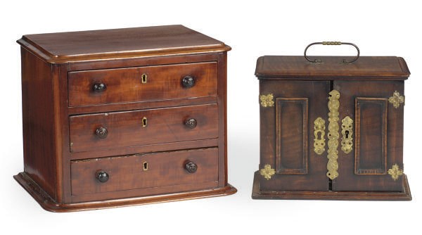 A MAHOGANY MINIATURE CHEST-OF-DRAWERS,