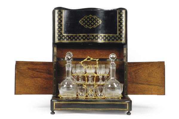 A NAPOLEON III BRASS INLAID EBONIZED AND ROSEWOOD TANTALUS**,