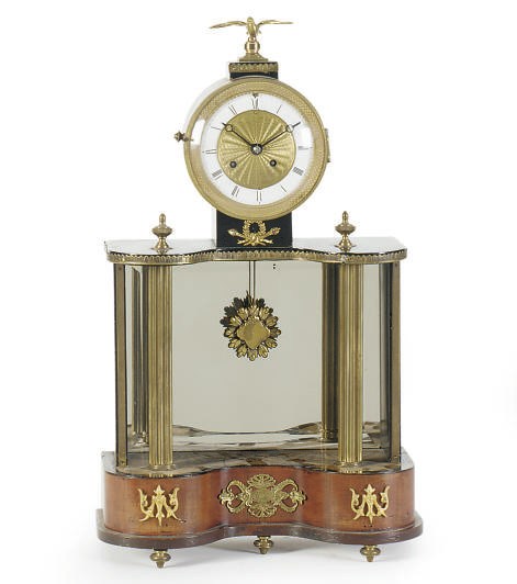 A NORTH EUROPEAN GILT-BRONZE MOUNTED INLAID FRUITWOOD AND PART-EBONIZED MANTELCLOCK,