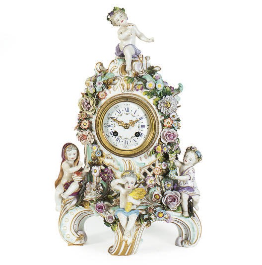 A CONTINENTAL PORCELAIN FIGURAL MANTELCLOCK,