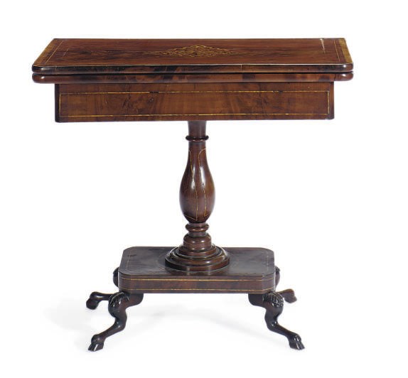 A NORTH EUROPEAN MAHOGANY, MARQUETRY AND PARQUETRY GAMES TABLE,