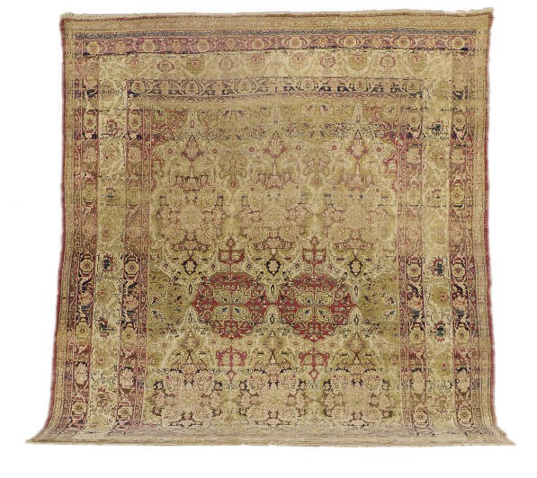 A KIRMAN CARPET,