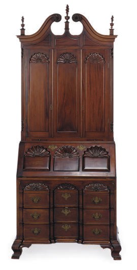 AN AMERICAN MAHOGANY DESK-AND-BOOKCASE,