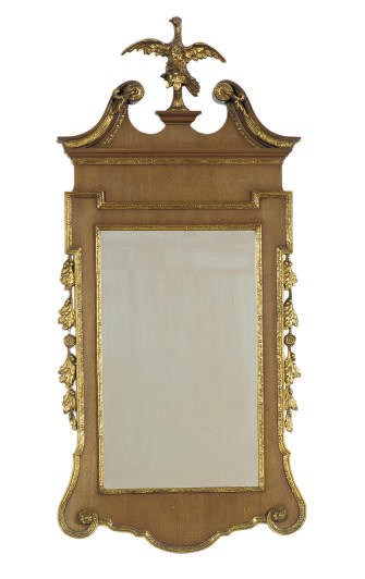 A MAHOGANY AND PARCEL-GILT MIRROR,